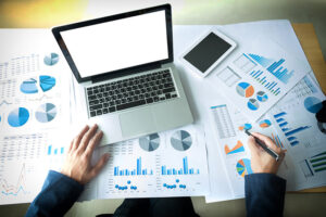 midsection businessman analyzing graphs desk 1